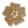 Broche florale dorée avec perles